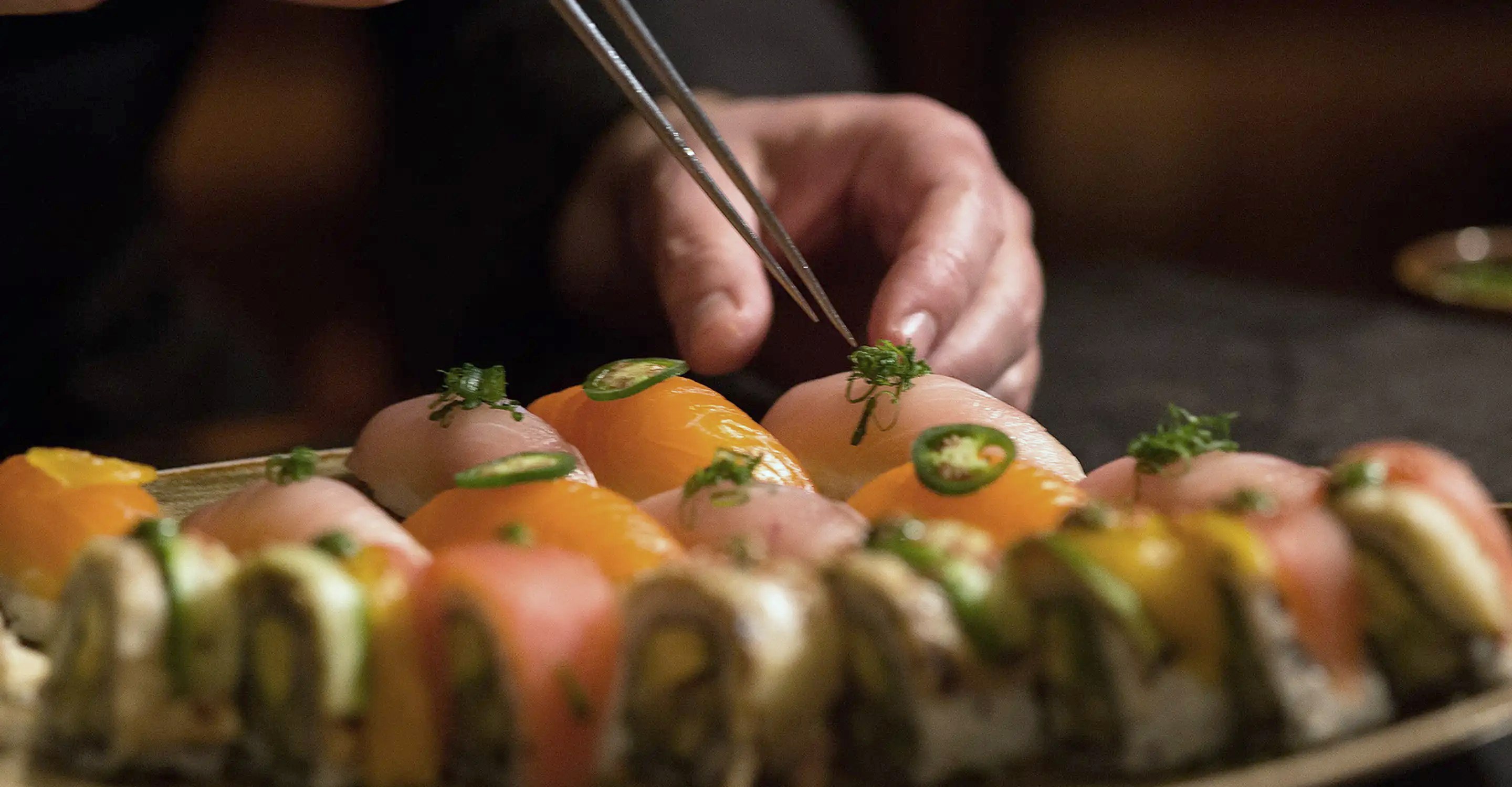 Close-up of sushi being plated at Buddha-Bar Monte-Carlo