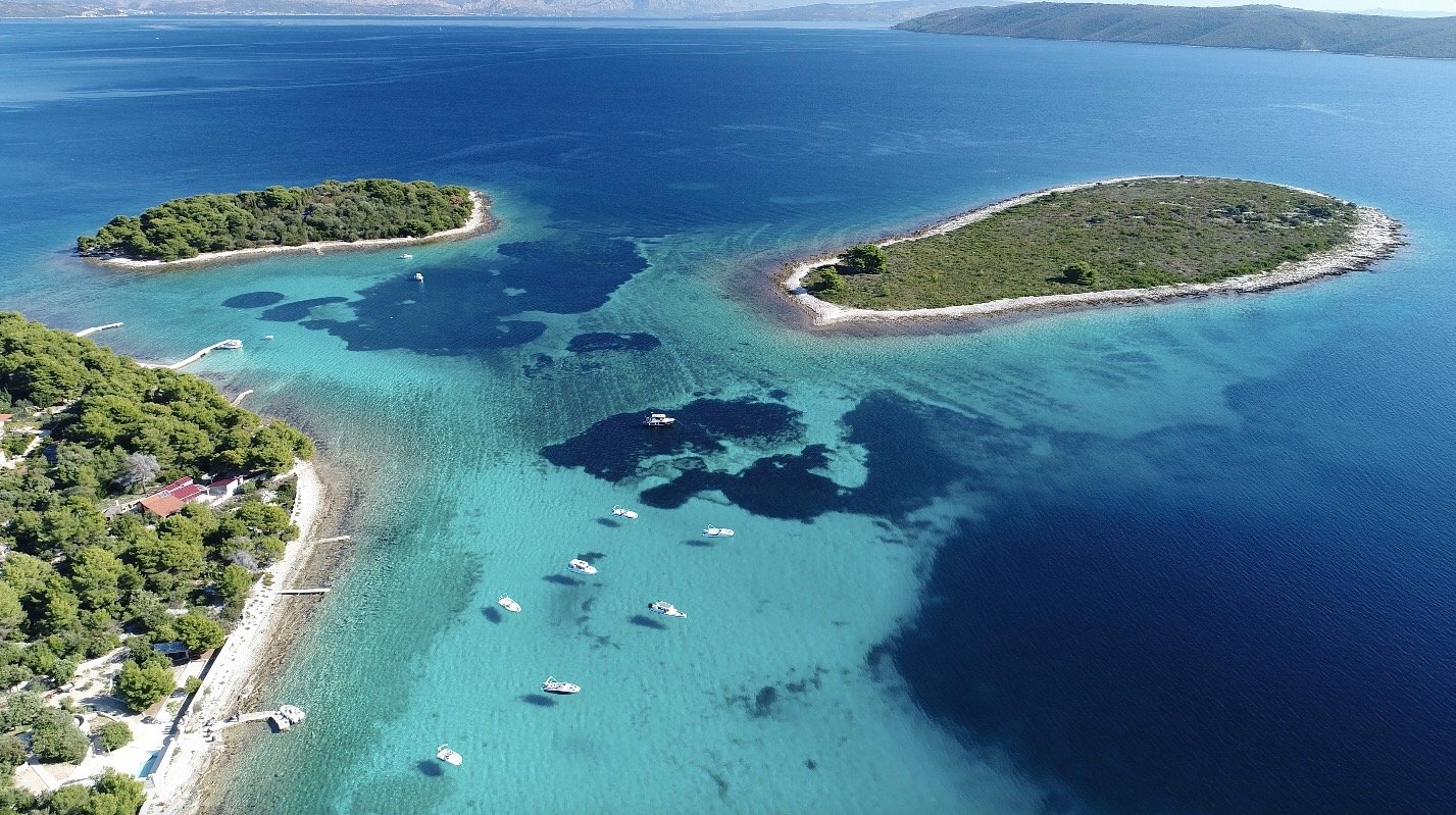 Blue Lagoon near Trogir, boats at anchor over turquoise shallows