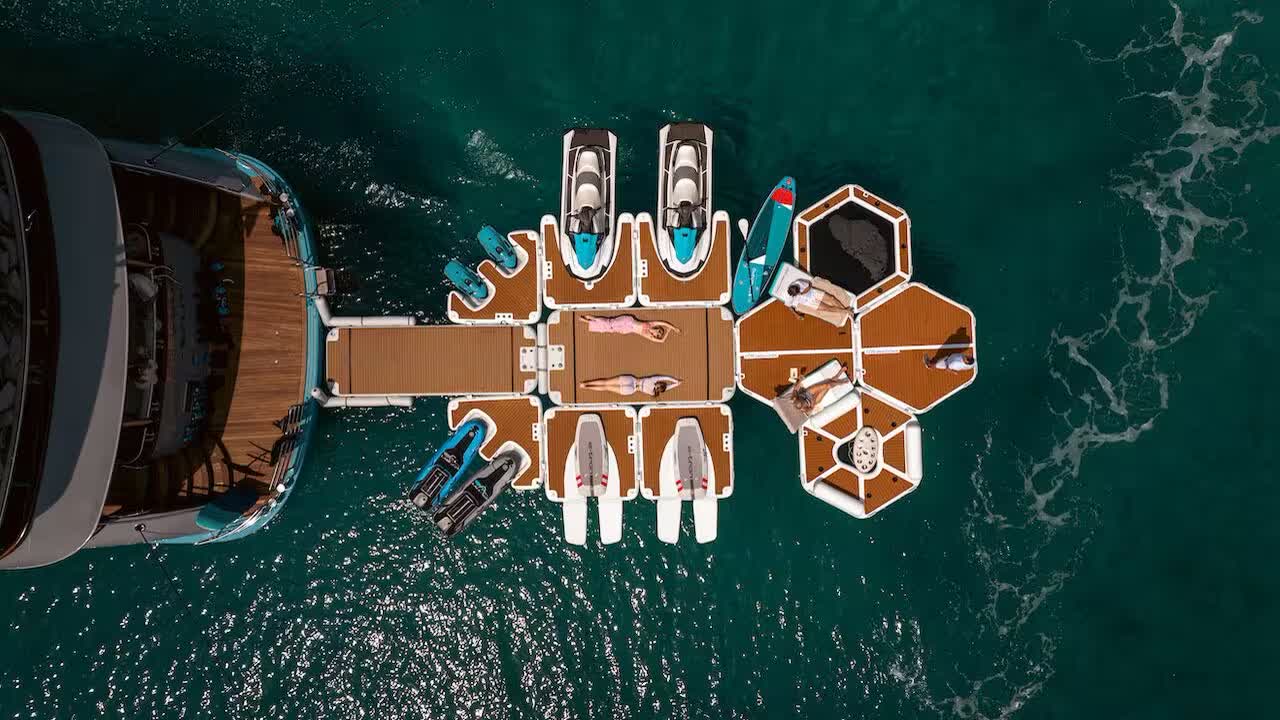 Freedom's floating platforms and water toys spread out astern