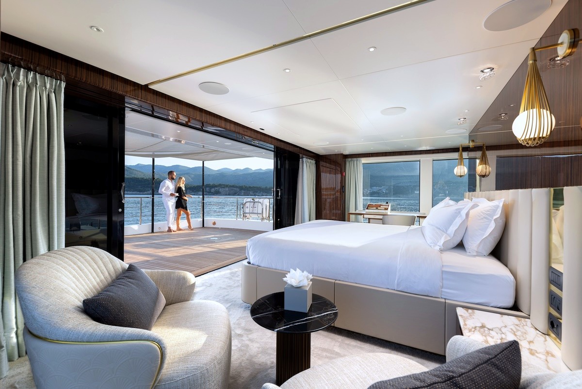One of Enjoy's two master cabins, with wide windows and a sitting area