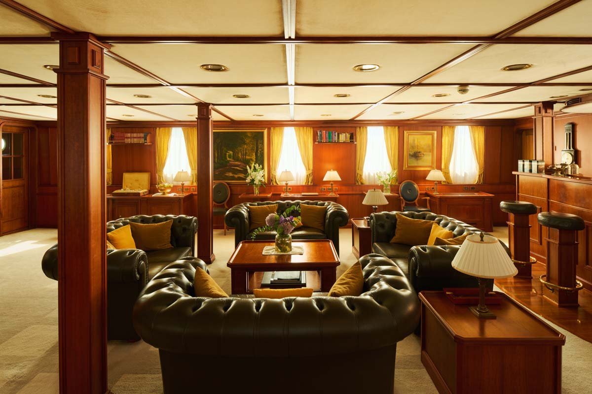 Seagull II's Art Nouveau main salon with leather Chesterfields