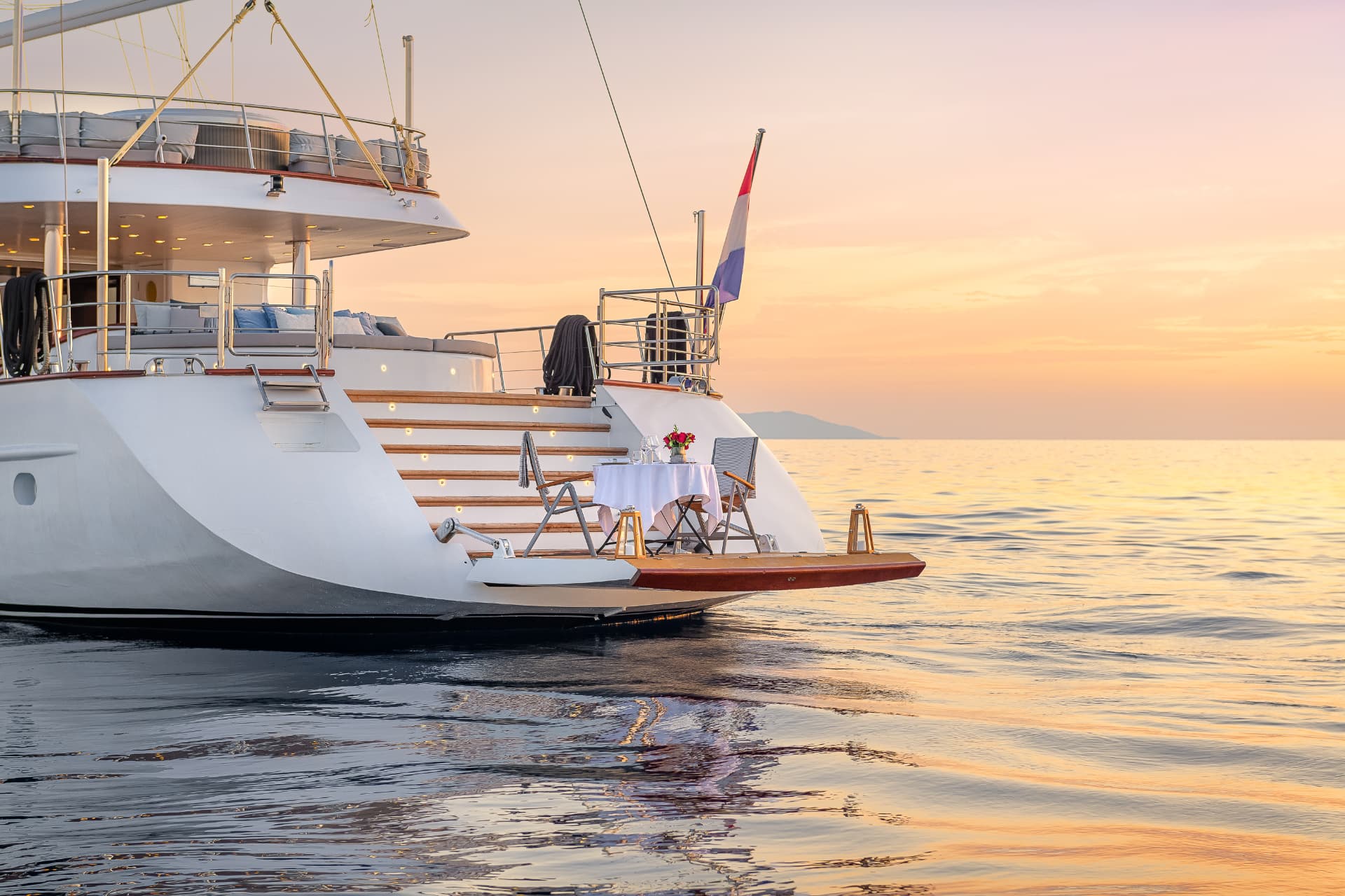 Lady Gita's stern bathed in golden sunset light