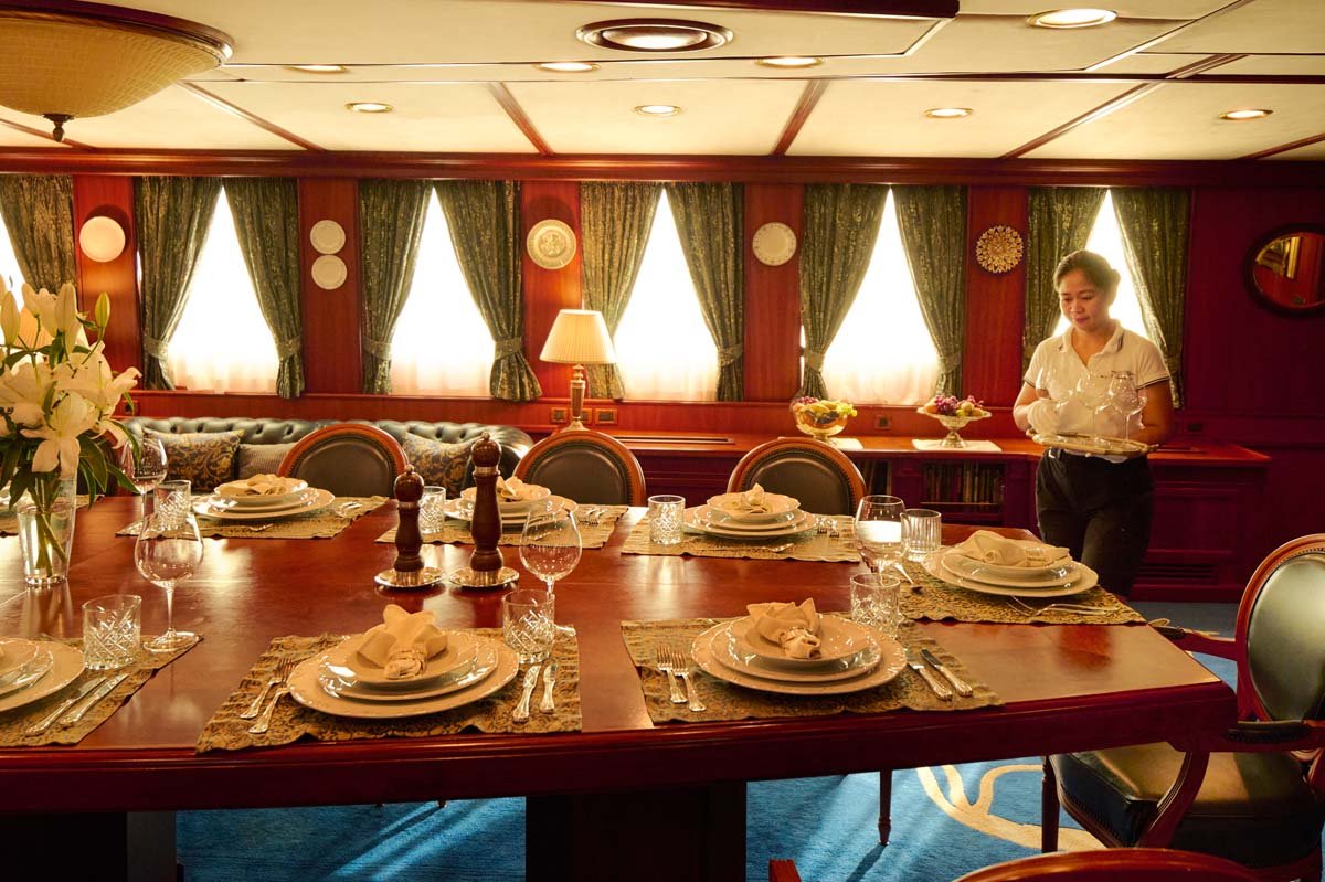 Seagull II's formal dining room set for dinner