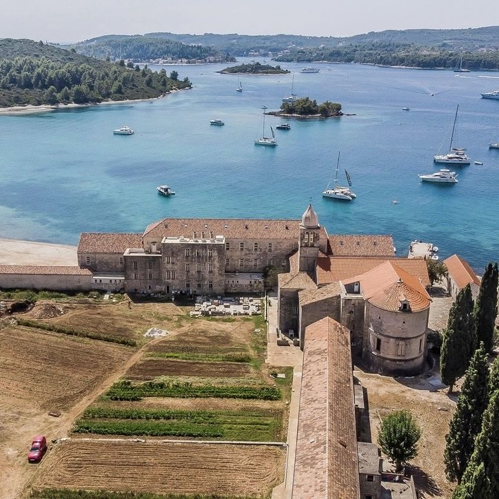 The Franciscan monastery on Badija, yachts anchored in the bay