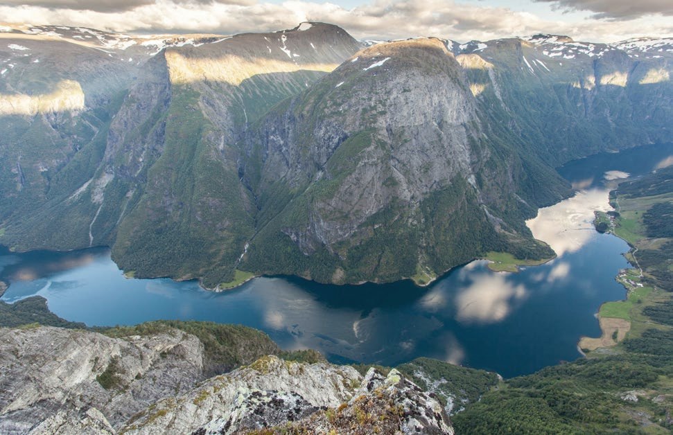 Looking down on the narrow Nærøyfjord between steep mountains