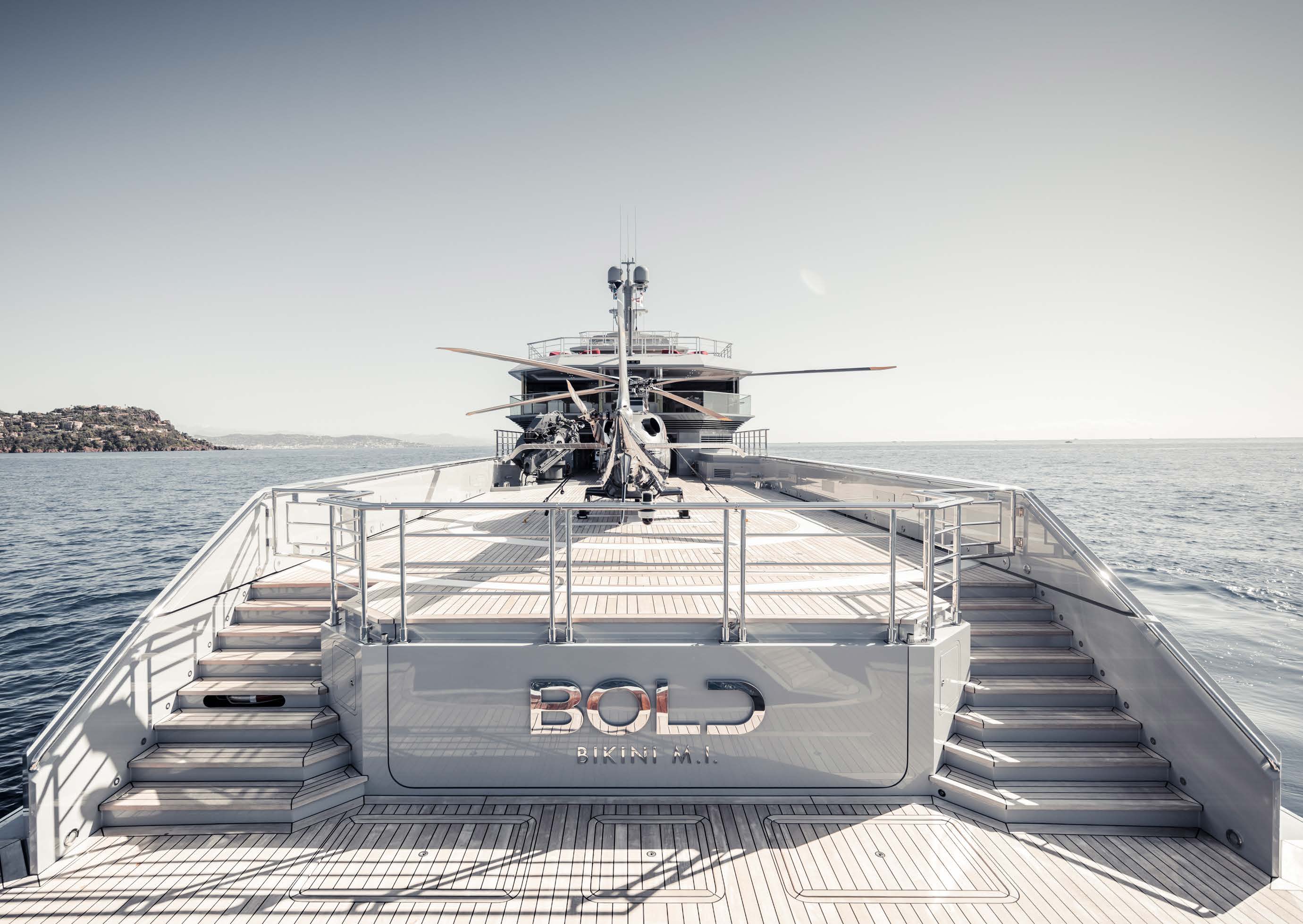 Bold's aft deck and certified helipad with a helicopter aboard