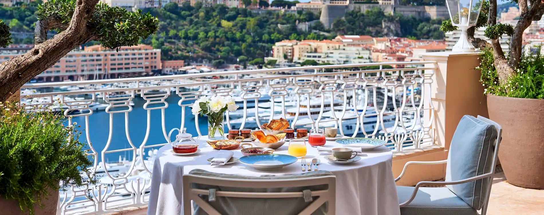 Breakfast on the terrace at Pavyllon, above the port and the Rock