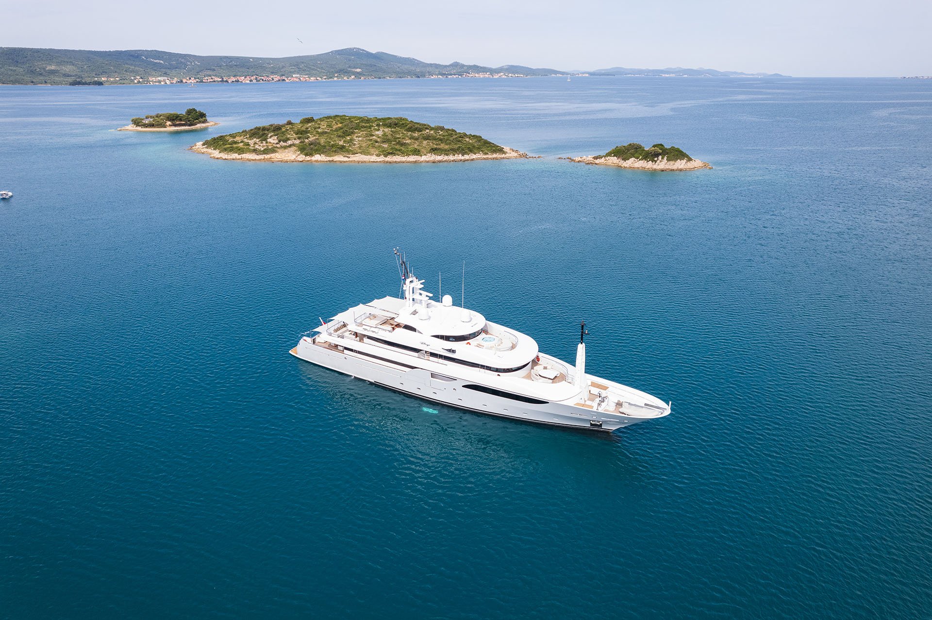 Taleya anchored off a small Mediterranean island