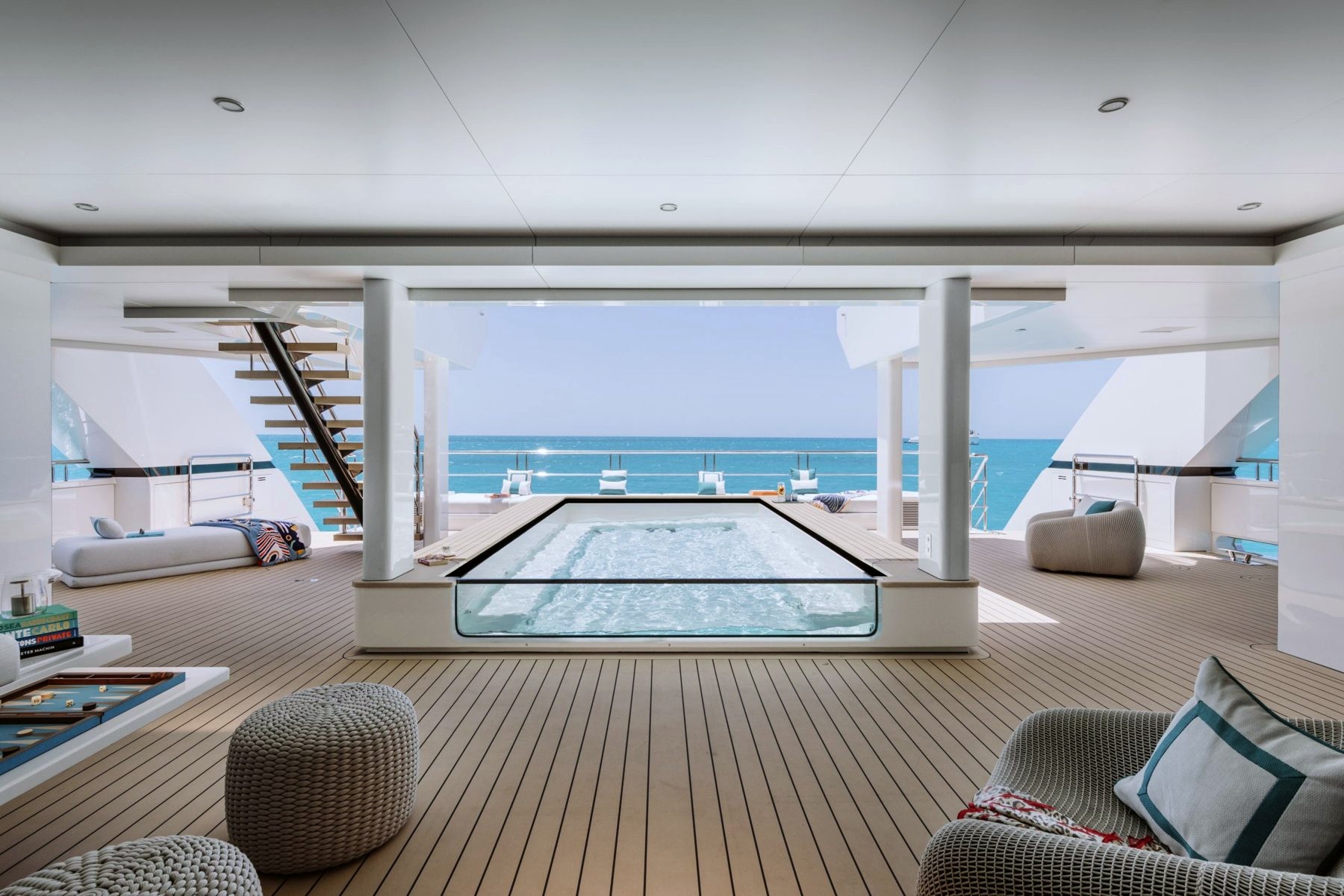 REDUCE's open deck lounge with a pool and sea views. Image: Silver Yachts